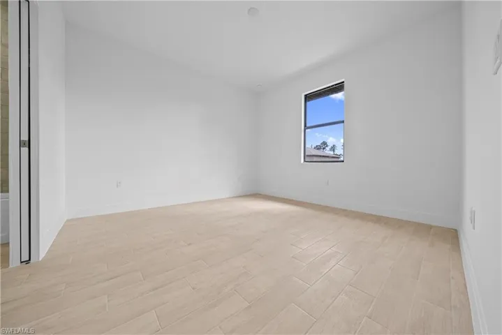 Empty room with wood finish floors