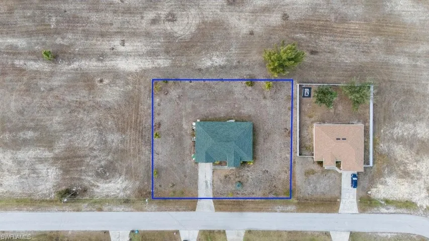 Aerial overview of property's location featuring property boundaries highlighted