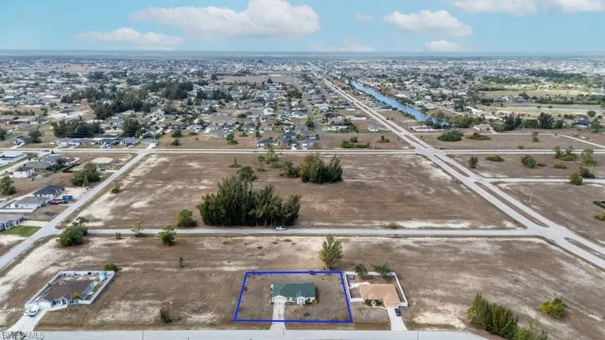 Aerial overview of property's location with property parcel outlined