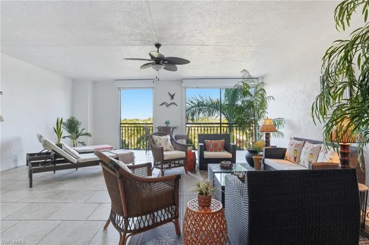 View of patio / terrace with a ceiling fan and outdoor furniture