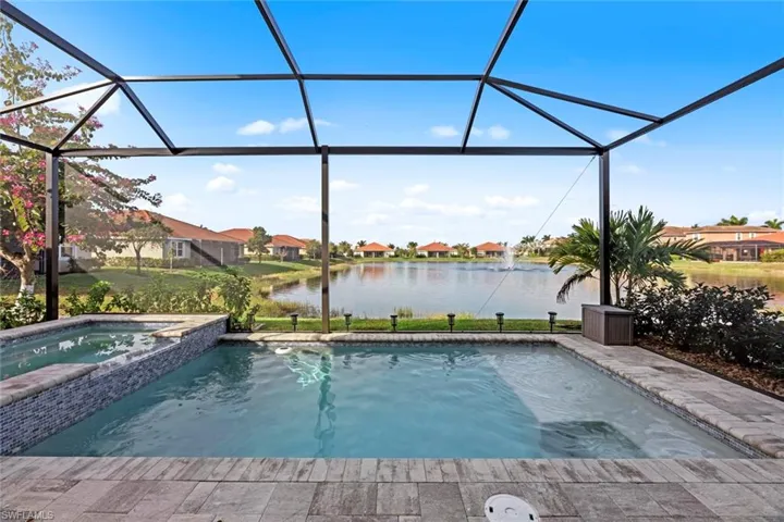 Custom saltwater pool and spa overlooking the lake. W exposure for the best SWFL sunsets
