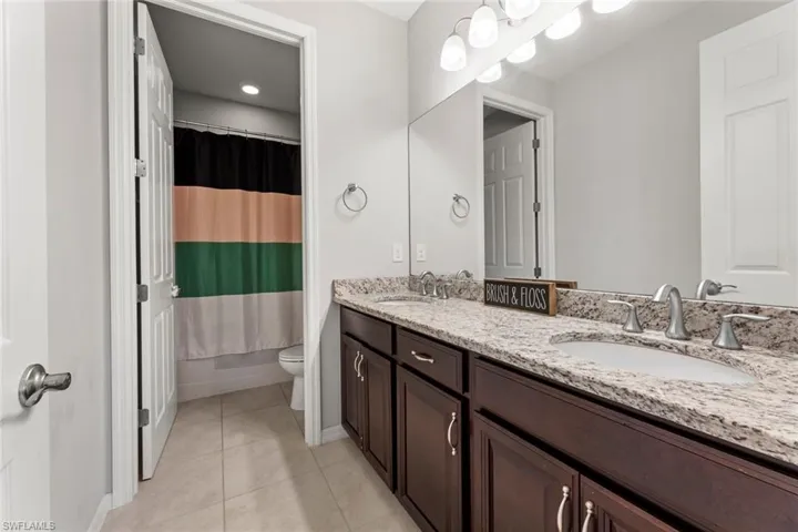 Upstairs Bathroom with shower and tub combo to make bathtime easy