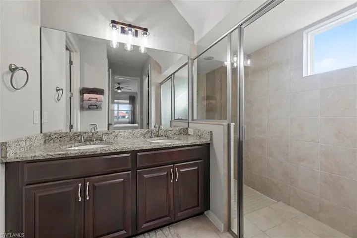 Large walk in shower and dual sinks in master bathroom