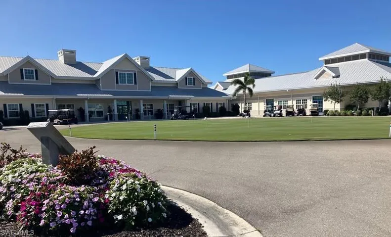 View of community with an area to practice putting