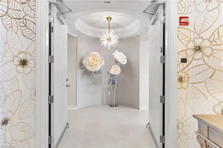 Artist hand-painted foyer walls, custom artistry pieces and unique lighting greet you as you step off of your private elevator.