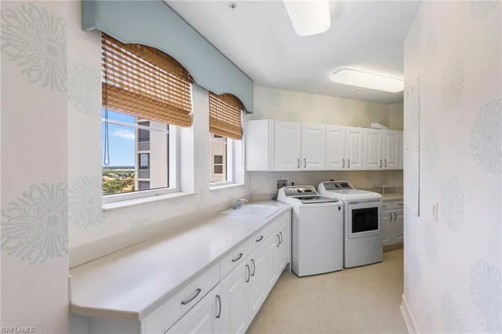 Massive laundry room has natural light spilling into this space!