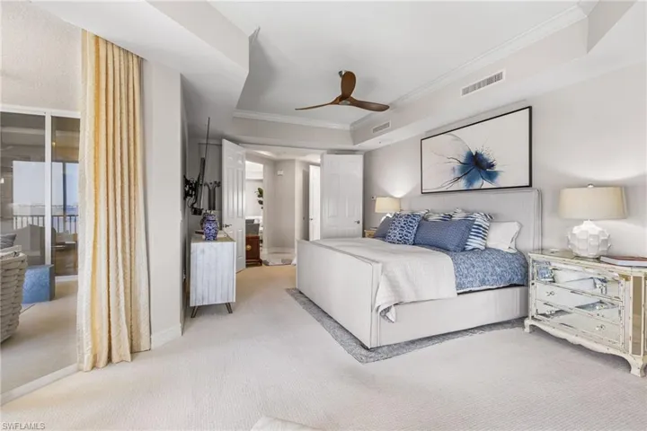 Your primary bedroom has a relaxing seating area with views of the river.
