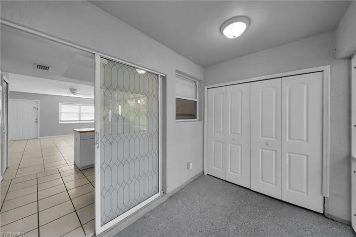 Unfurnished bedroom with a closet
