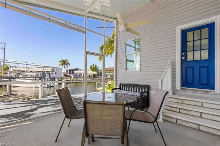 Screened Patio overlooking the boat lift and canal.