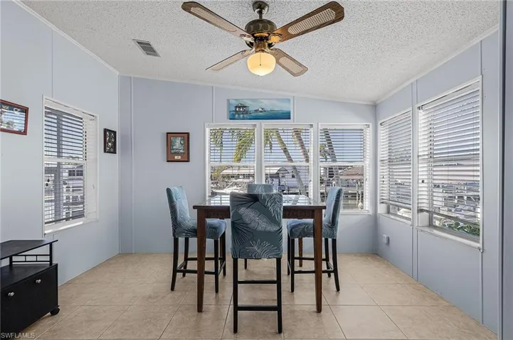 This den/study has plenty of natural light.  Add a sleeper sofa for a 3rd bedroom.
