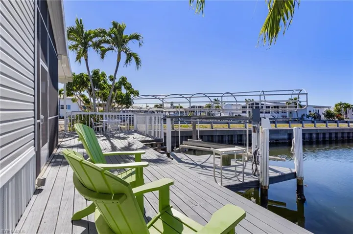 Enjoy the warm tropical breezes and sunshine while fishing from your dock.