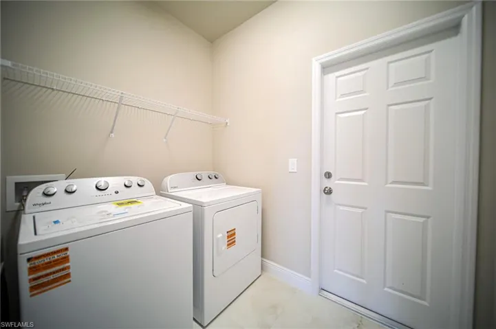 Brand New Washer And Dryer And Metal Shelving In The Laundry Room!