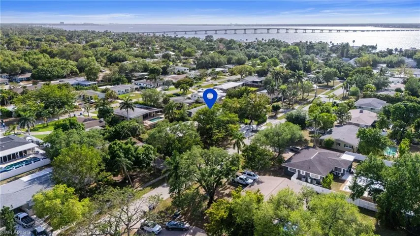 Aerial view with a water view and a residential view
