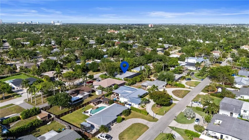 Birds eye view of property with a residential view