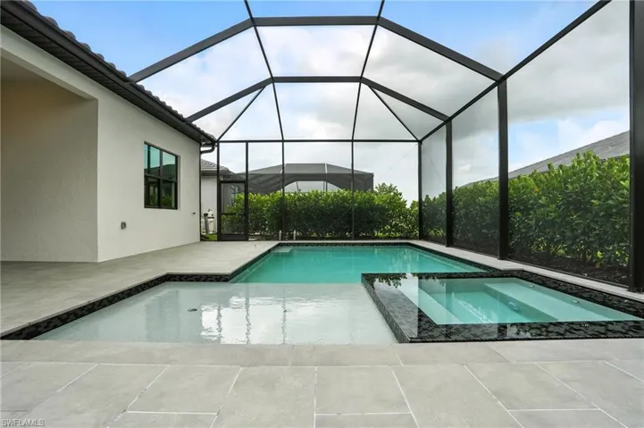 Pool with porcelain tile deck