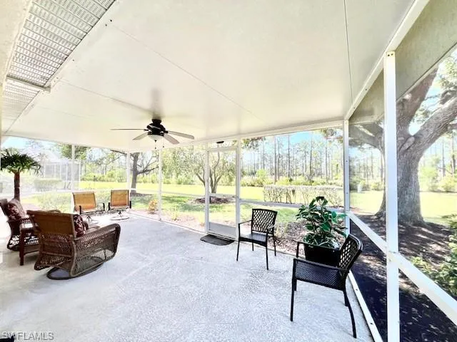 View of patio featuring ceiling fan