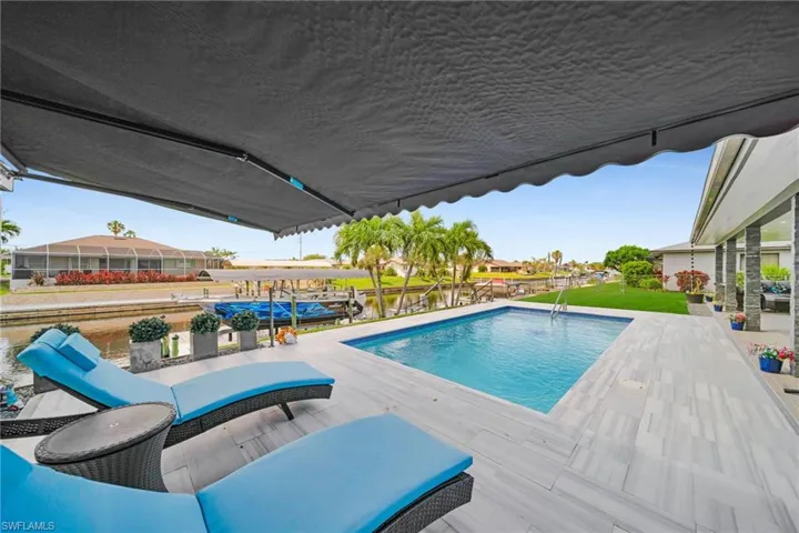 Pool with a patio area