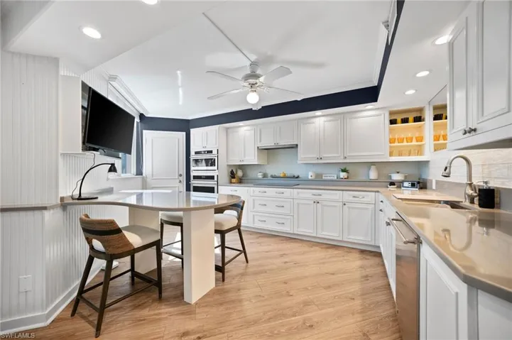 Well-designed kitchen with convenient roll-out drawers.
