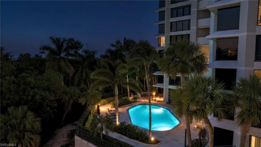 Large pool & spa with preserve view and privacy!  2 guest suites available for owner's use, renovated community room & gym, private tennis & pickleball court, secure under-building parking & separate storage, live-in & on-site management & capability of electric vehicle charging in the garage.