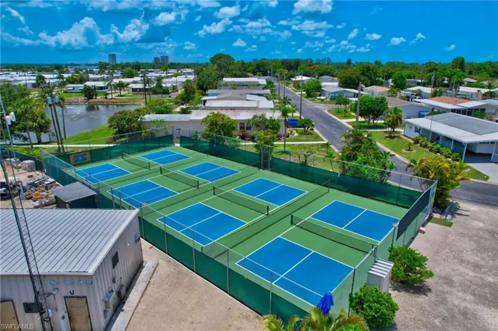 Aerial view of residential area with a large body of water