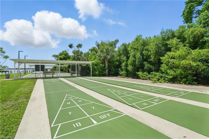 View of community featuring shuffleboard