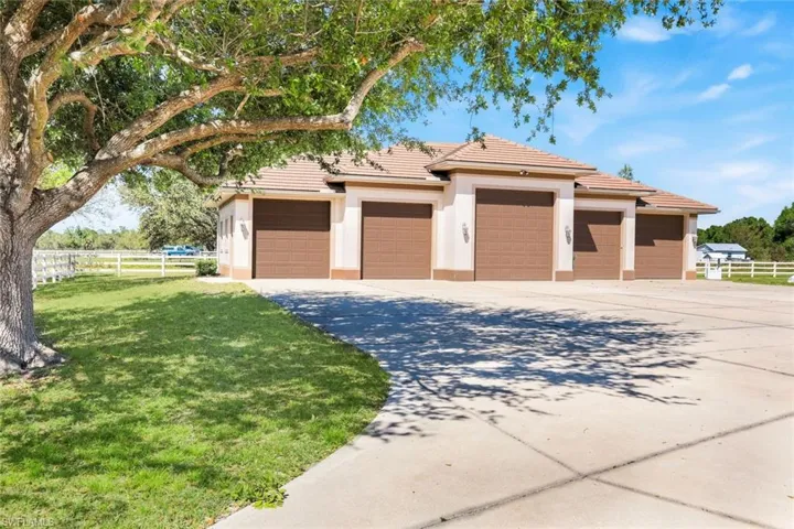 Additional 5 car garage with RV hookup.
