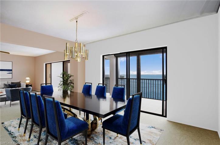 Virtually Staged.  The large Dining Room is perfect for entertaining with a sunset backdrop!