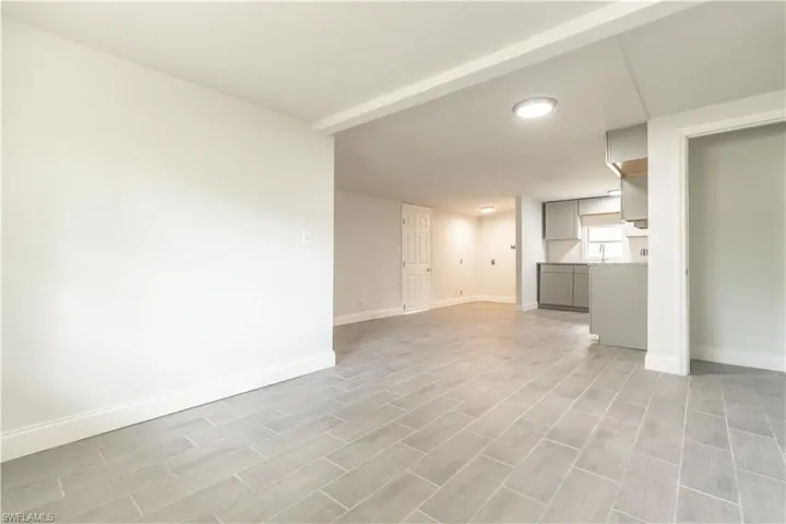 Unfurnished living room with light wood-type flooring
