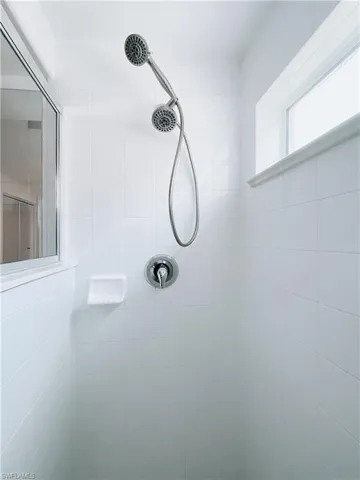 Bathroom with a tile shower