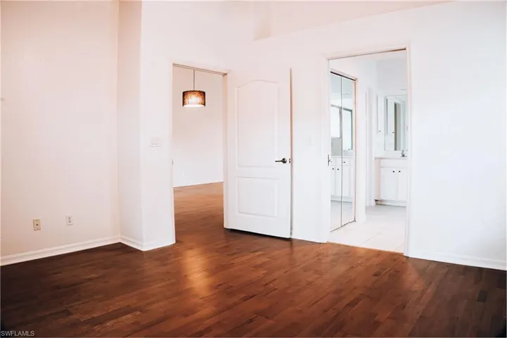 Unfurnished room featuring hardwood / wood-style floors