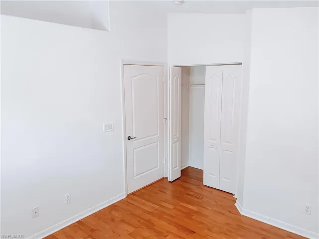 Unfurnished bedroom featuring light hardwood / wood-style floors