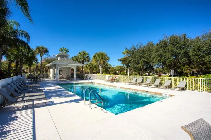 Community pool next to building