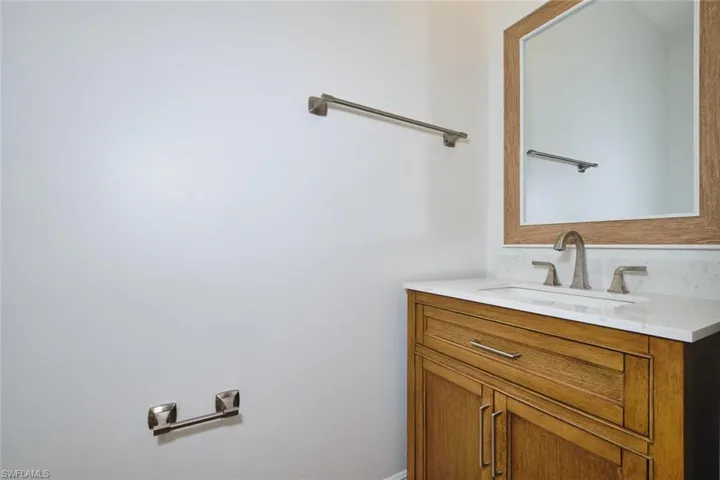 Downstairs half bath - new vanity, mirror and hardware