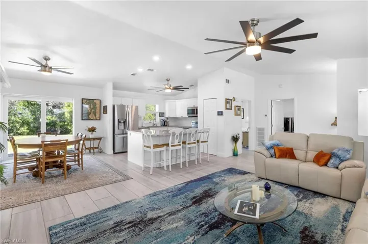 Well appointed kitchen with island and all newer tile throughout the home