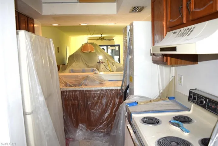 KITCHEN TOWARDS DINING, LIVING AREA