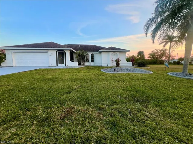 Single story Florida style split bedroom ranch. An updated contemporary 4 bedroom home on the water with gulf access featuring a electric boat lift composite and concrete deck pool lani and generous yard.