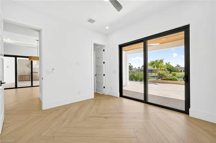 Empty room featuring recessed lighting and ceiling fan