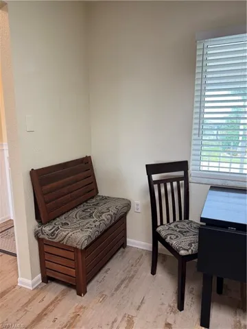 bench with storage and dining table and chairs