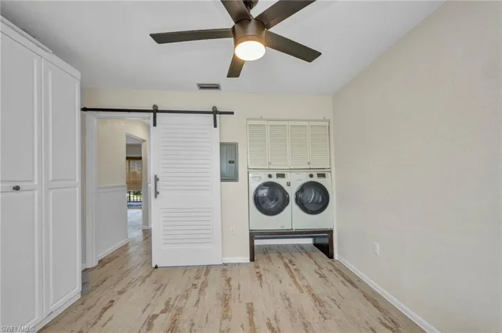 In unit laundry center, Murphy bed and updated electric panel