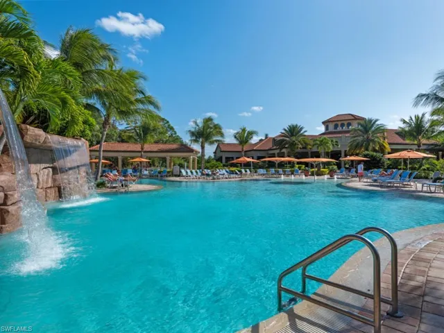 Community pool featuring a patio area