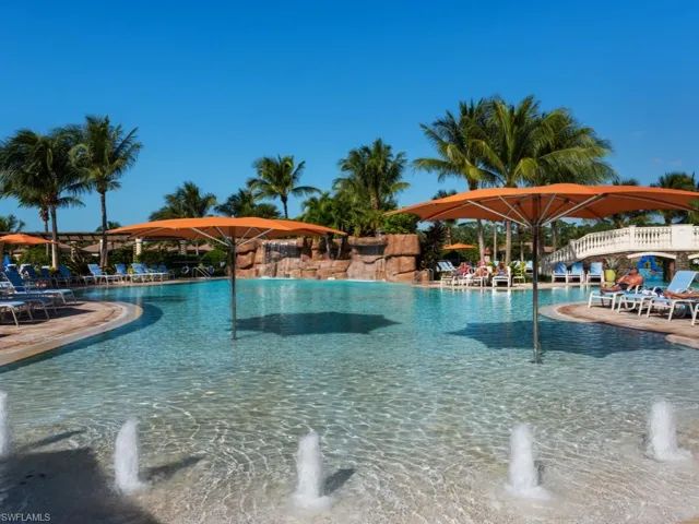 Community pool featuring a patio area