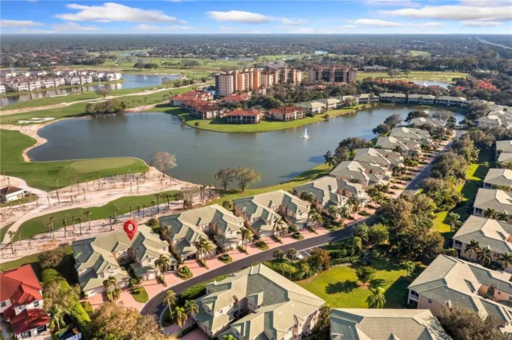 Bird's eye view featuring a water and golf course view