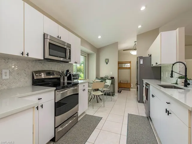 Kitchen with quartz countertops, SS appliances