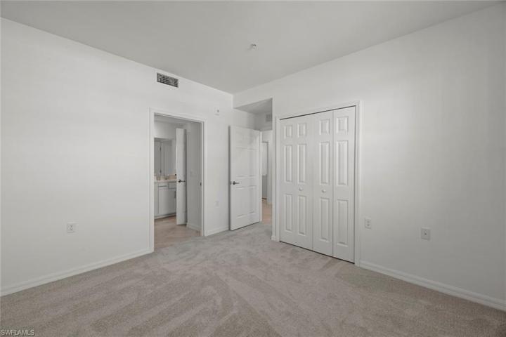 Guest Bedroom 2 with entrance to guest bath