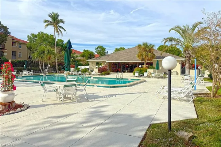 View of swimming pool with a patio