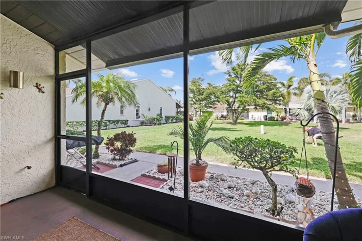 Sunroom featuring plenty of natural light