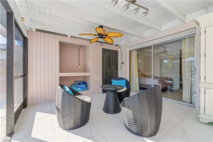 View of patio featuring ceiling fan and outdoor lounge area