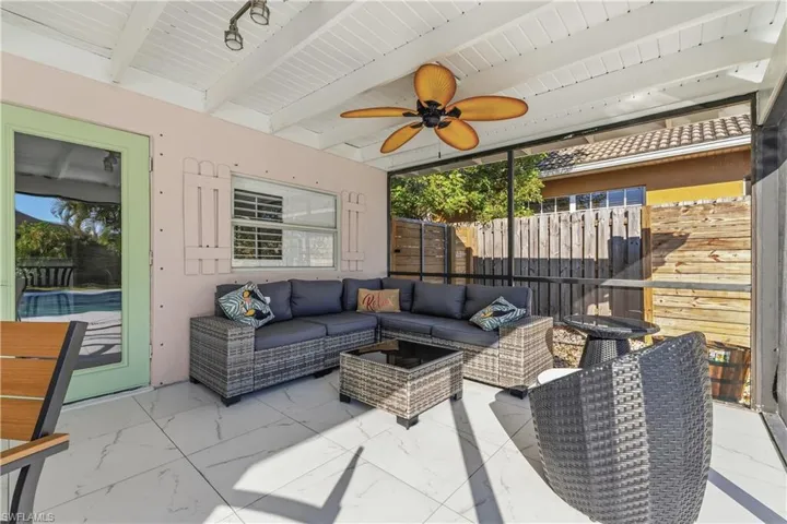 View of patio featuring a ceiling fan and an outdoor hangout area