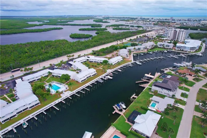 Bird's eye view of a marina and a nearby body of water