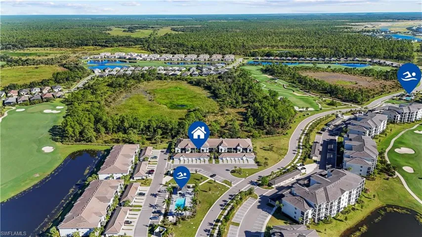 Aerial view featuring multi-unit structures, multiple swimming pools, and manicured golf course grounds